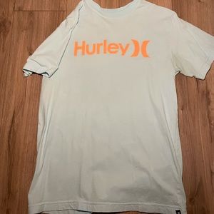Hurlys T shirt light blue and orange writing